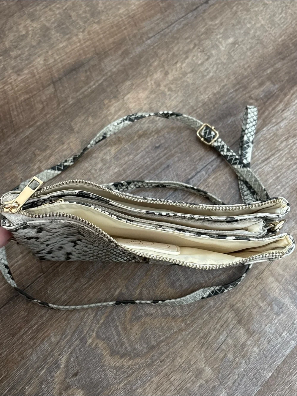 Python-Print Crossbody Wristlet in Black and Cream